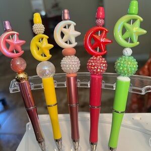 Cute moon and star hand beaded ink pens each sold separately.